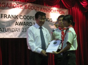 Amanda receiving the award from G.O.H.