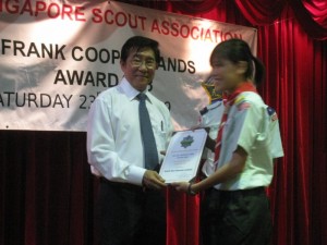 Mabel receiving the award from G.O.H.