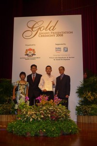 Ken with his parents and Mr Giam